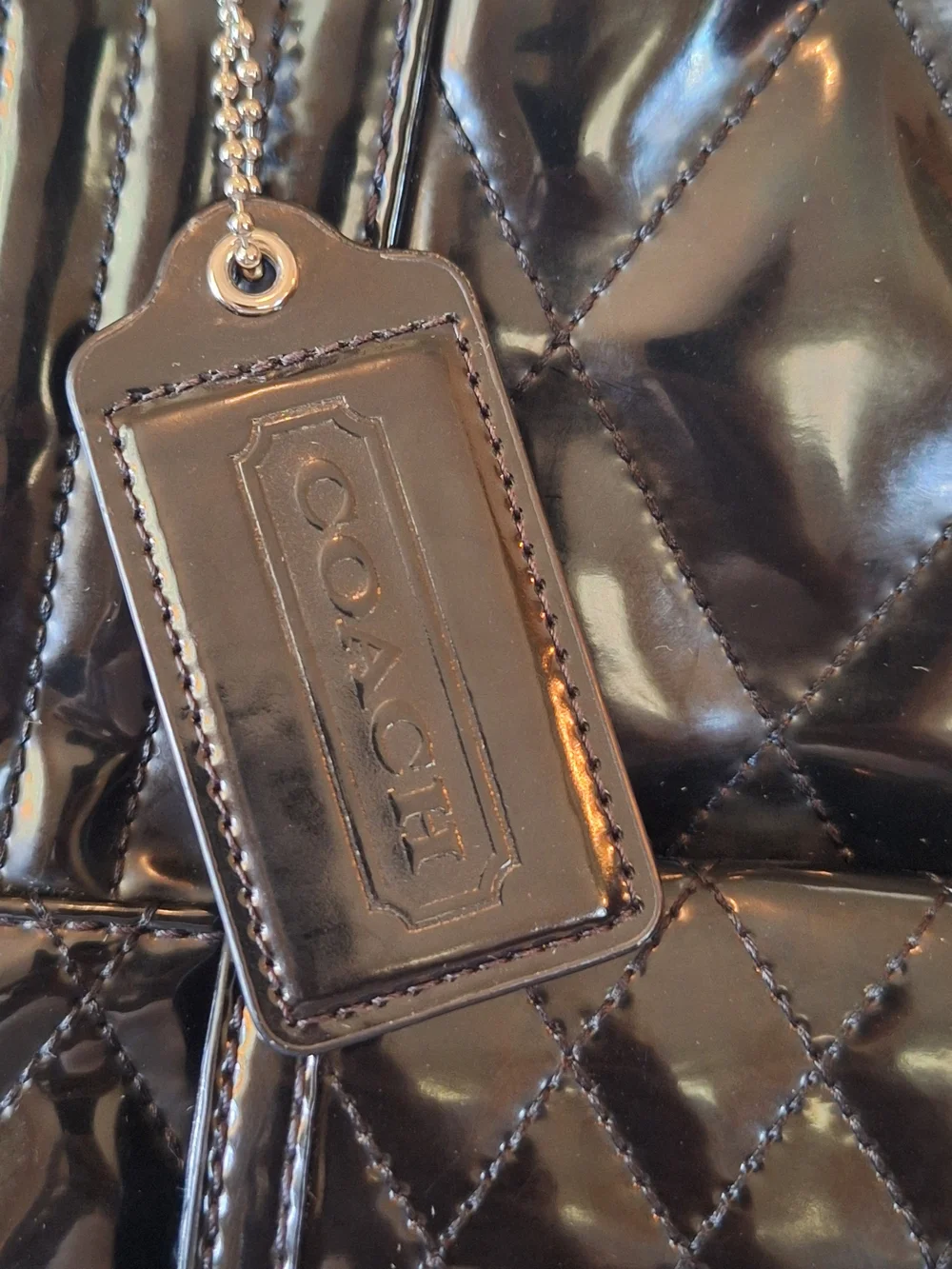 Coach sleek black